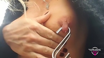 Nippleringlover Horny Milf Outdoor Nipple Torture Stretching Extreme Nipple Piercings With Hooks
