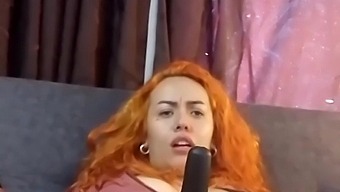 A Stunning Redheaded Webcam Model Pleasures Herself With Her Fingers